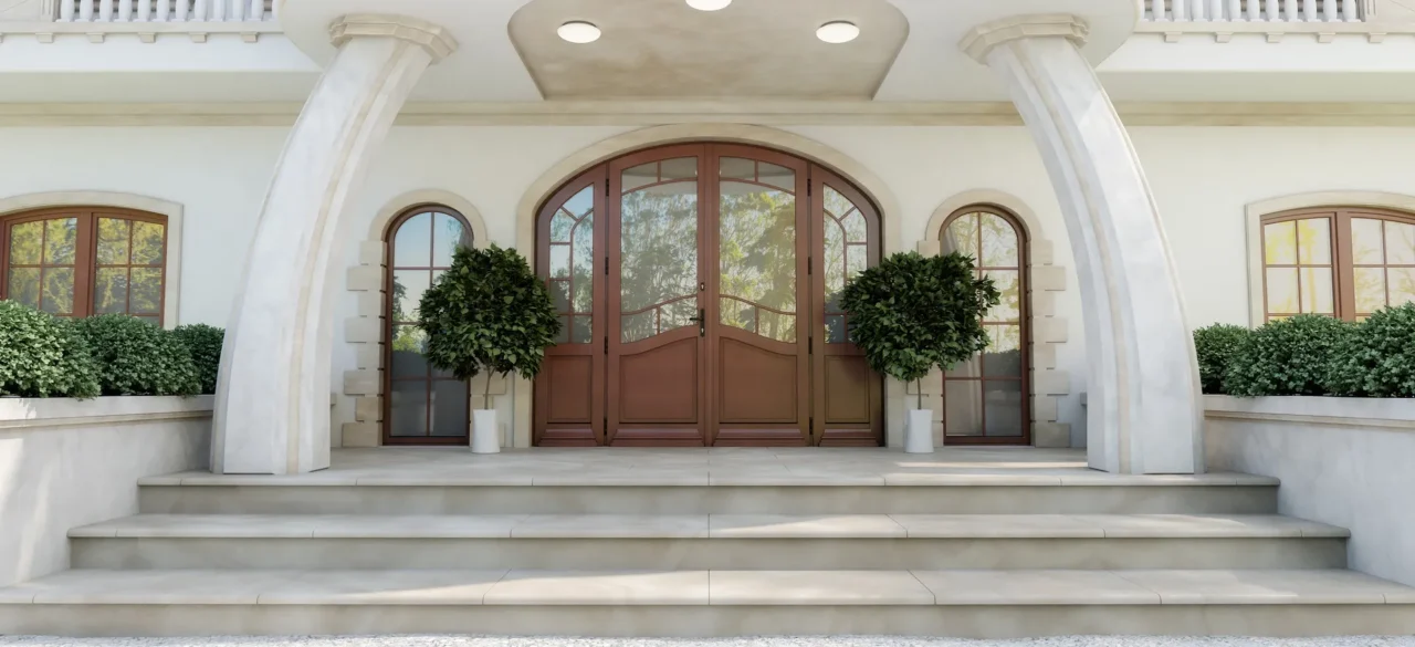 Porte d’entrée vitrée sur une façade claire